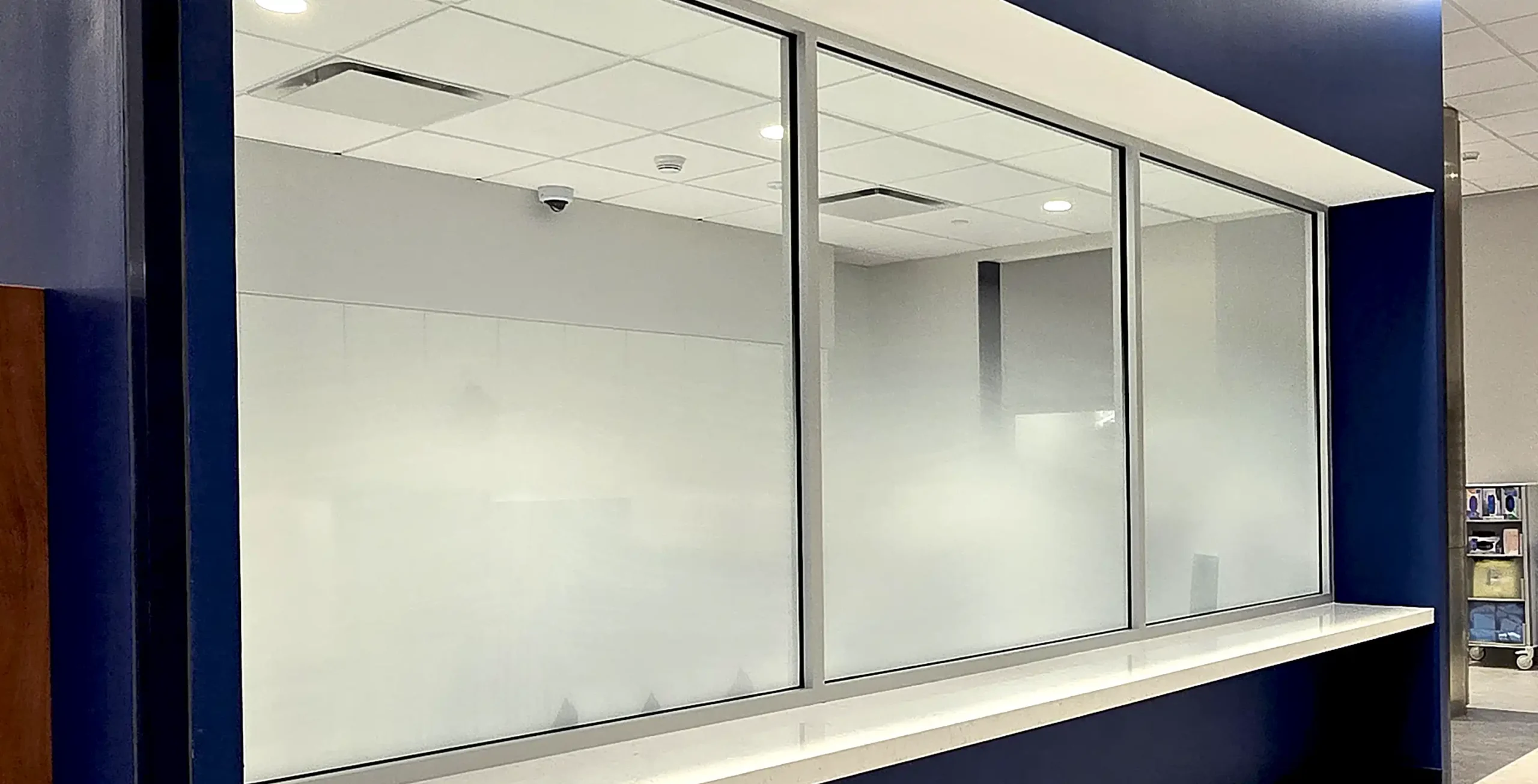 White gradient privacy film on commercial glass