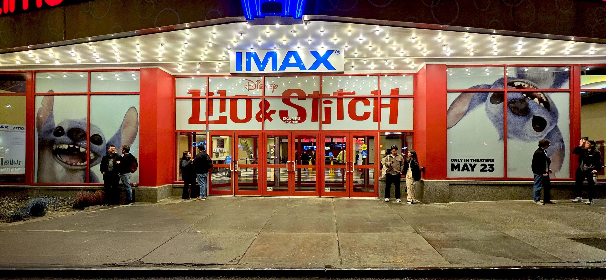 Window campaign graphics for a theater storefront